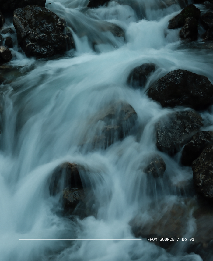 LEAU is 100% Swiss Water, Water flowing over rocks through a river with motion blur and a small title on the bottom that says From Source / No. 01