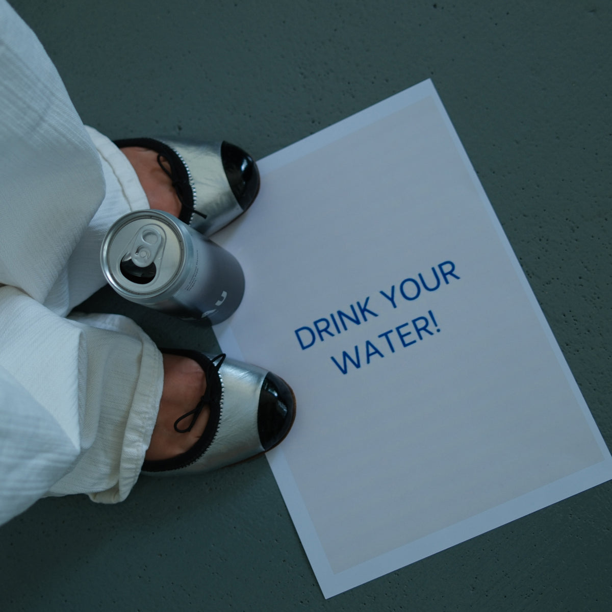 LEAU NIGHT can with Drink your Water page